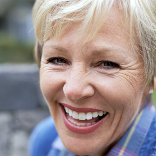 Close up of an older woman smiling