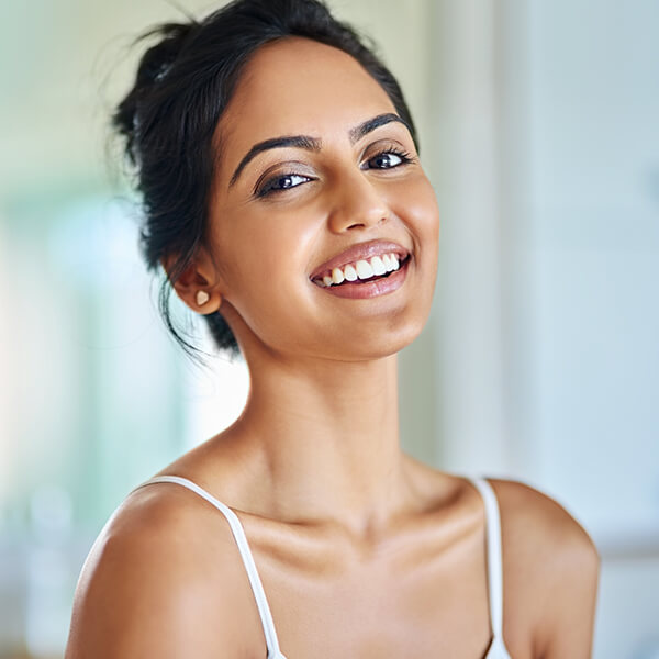 A woman smiling.